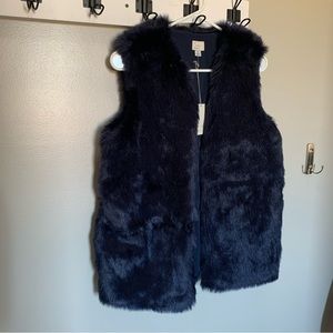 Navy blue faux fur vest.